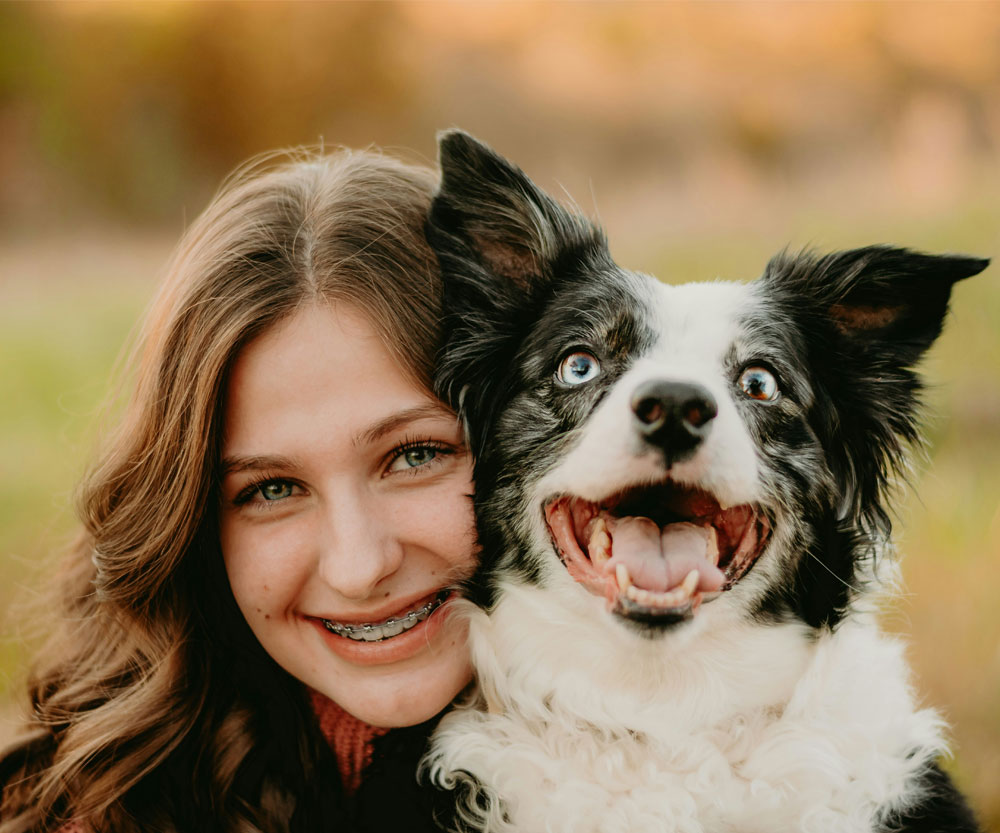 Happy pet holding by the lady